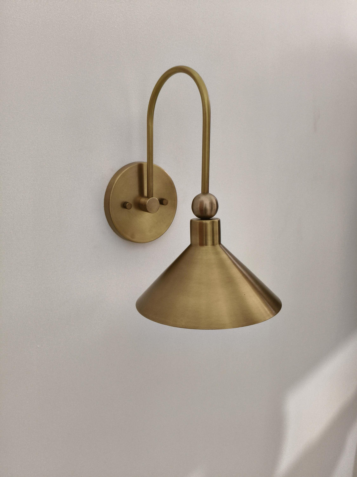 Contemporary Brass Wall Lamp With Cone Shade | Frost Lights