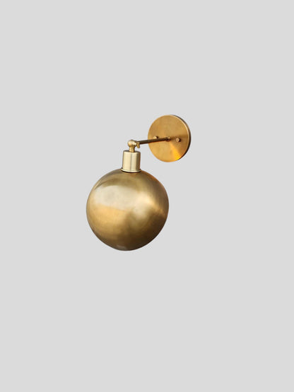 Handmade Articulated Brass Wall Sconce With Half Globe Shade | Frost Lights
