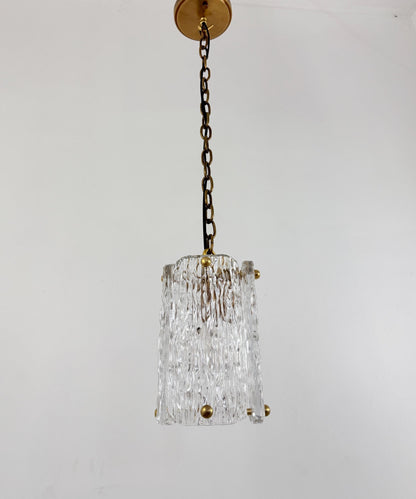 Frost Lights modern textured glass pendant lamp hanging display.