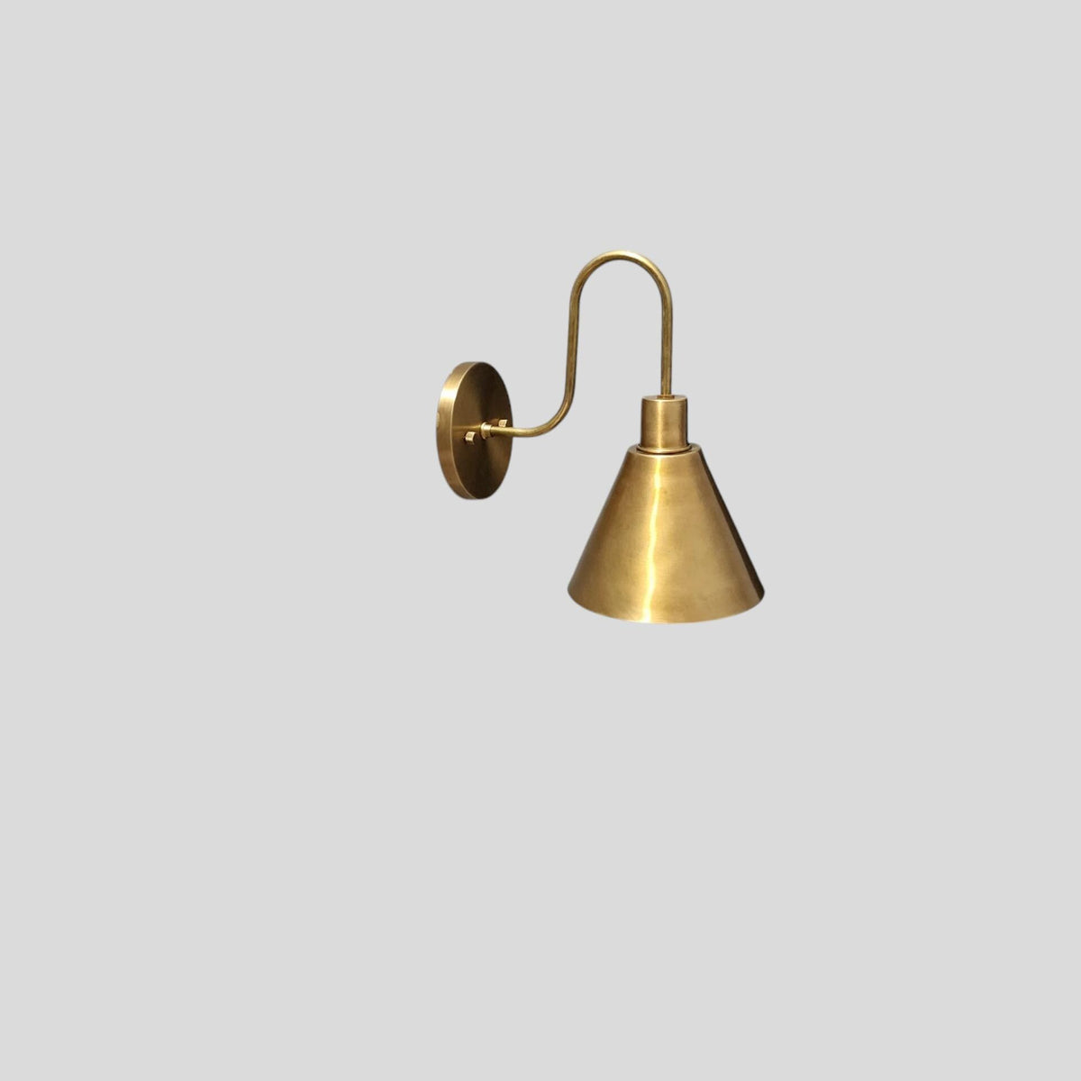 Handcrafted Brass Cone Wall Sconce, Front View | Frost Lights