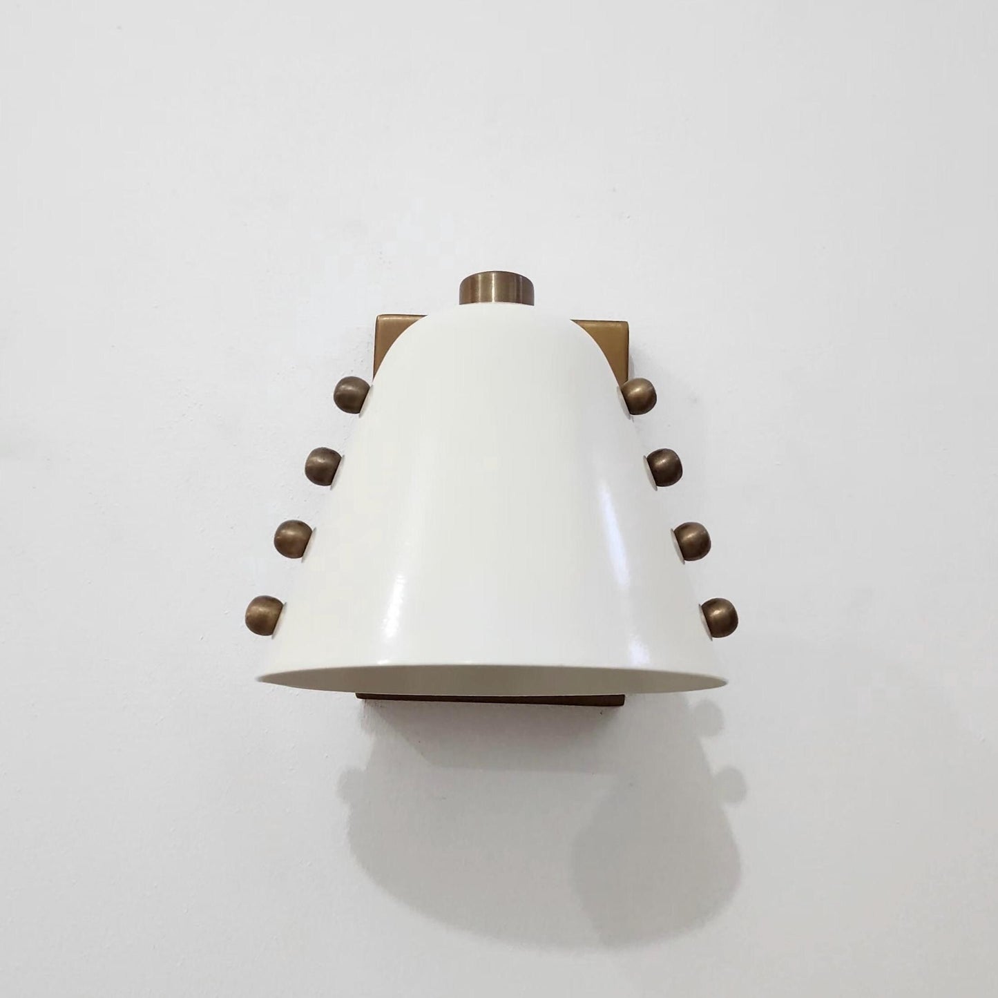 Ivory Cone Brass Wall Sconce with Rivet Detailing – Handcrafted Mid-Century Modern Wall Lamp