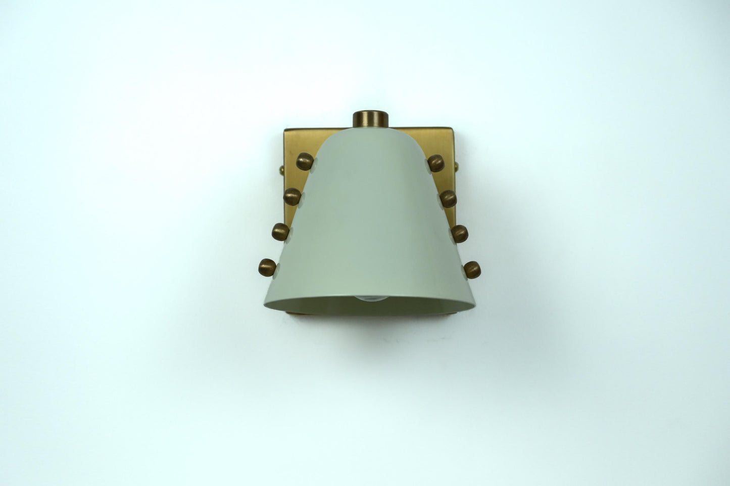 Ivory Cone Brass Wall Sconce with Rivet Detailing – Handcrafted Mid-Century Modern Wall Lamp