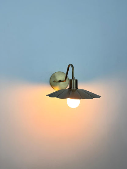 Modern Brass Flower Wall Sconce with Amber Shade | 10" W x 6" H - optimized image