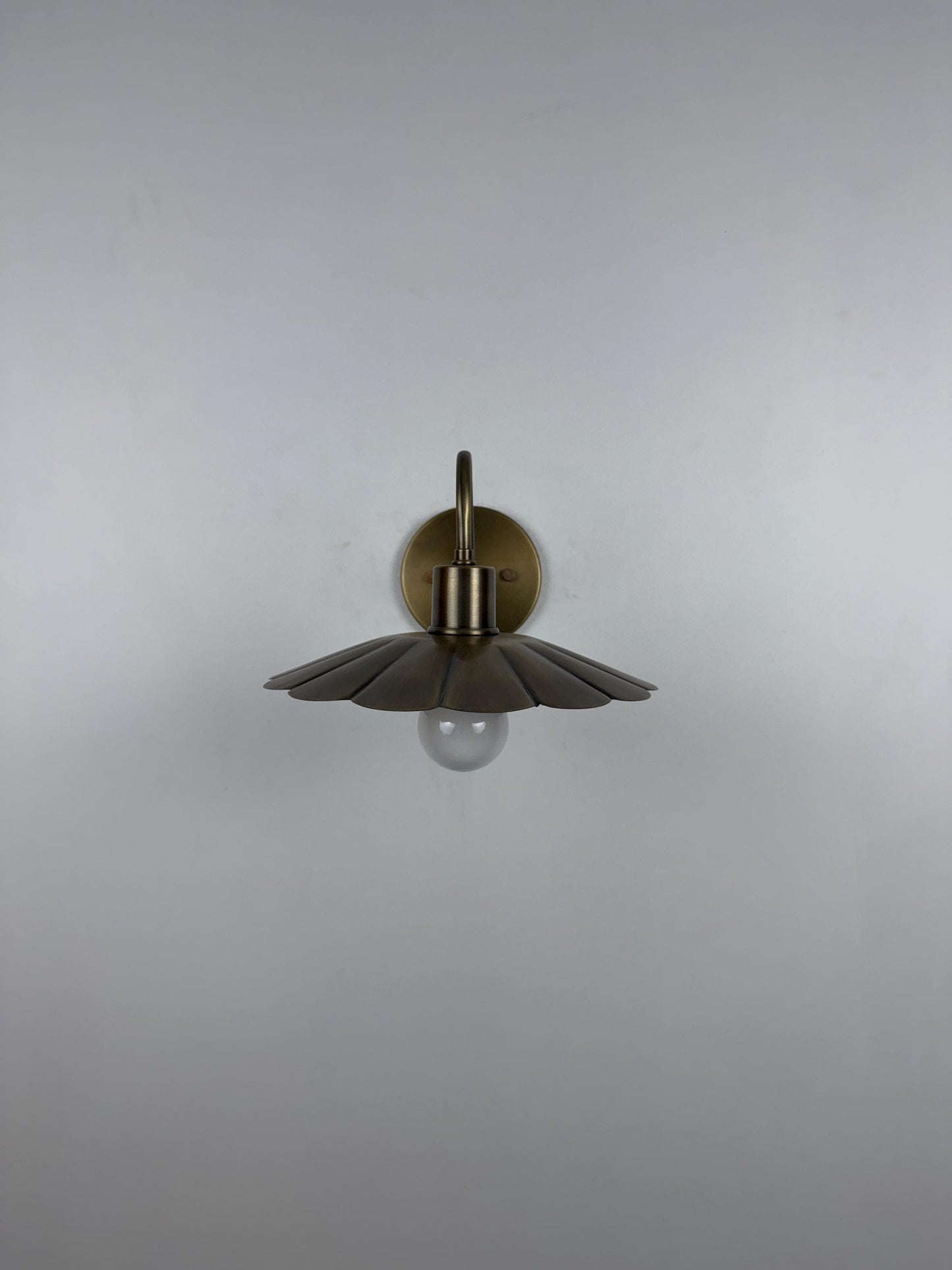 Modern Brass Flower Wall Sconce with Amber Shade | 10" W x 6" H