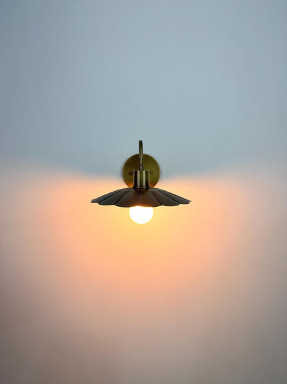 Modern Brass Flower Wall Sconce with Amber Shade | 10" W x 6" H - optimized image