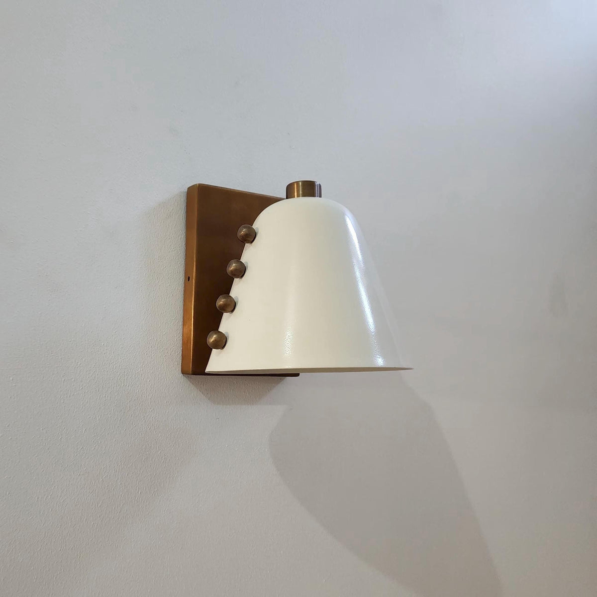 Ivory Cone Brass Wall Sconce with Rivet Detailing – Handcrafted Mid-Century Modern Wall Lamp - optimized image