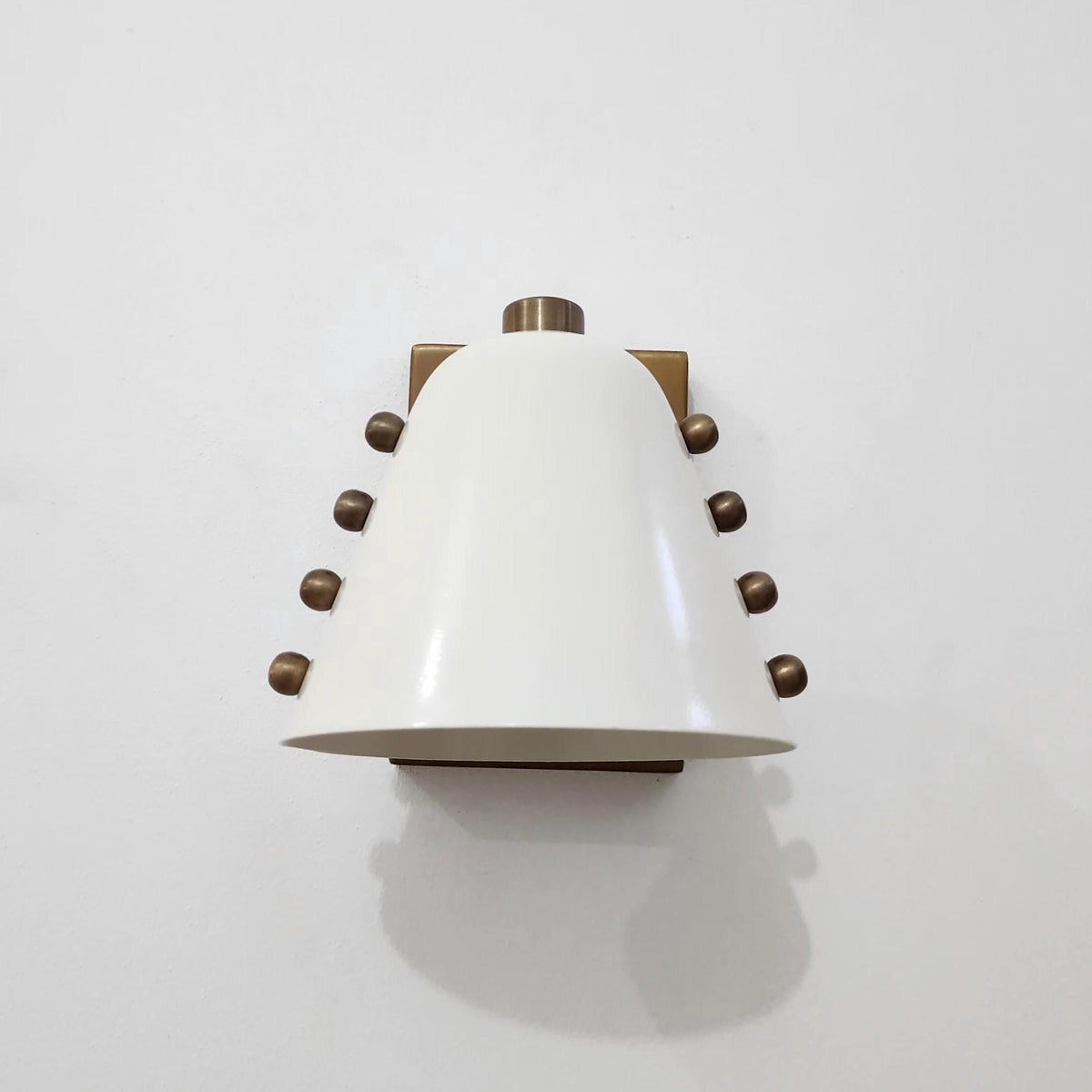 Ivory Cone Brass Wall Sconce with Rivet Detailing – Handcrafted Mid-Century Modern Wall Lamp - optimized image