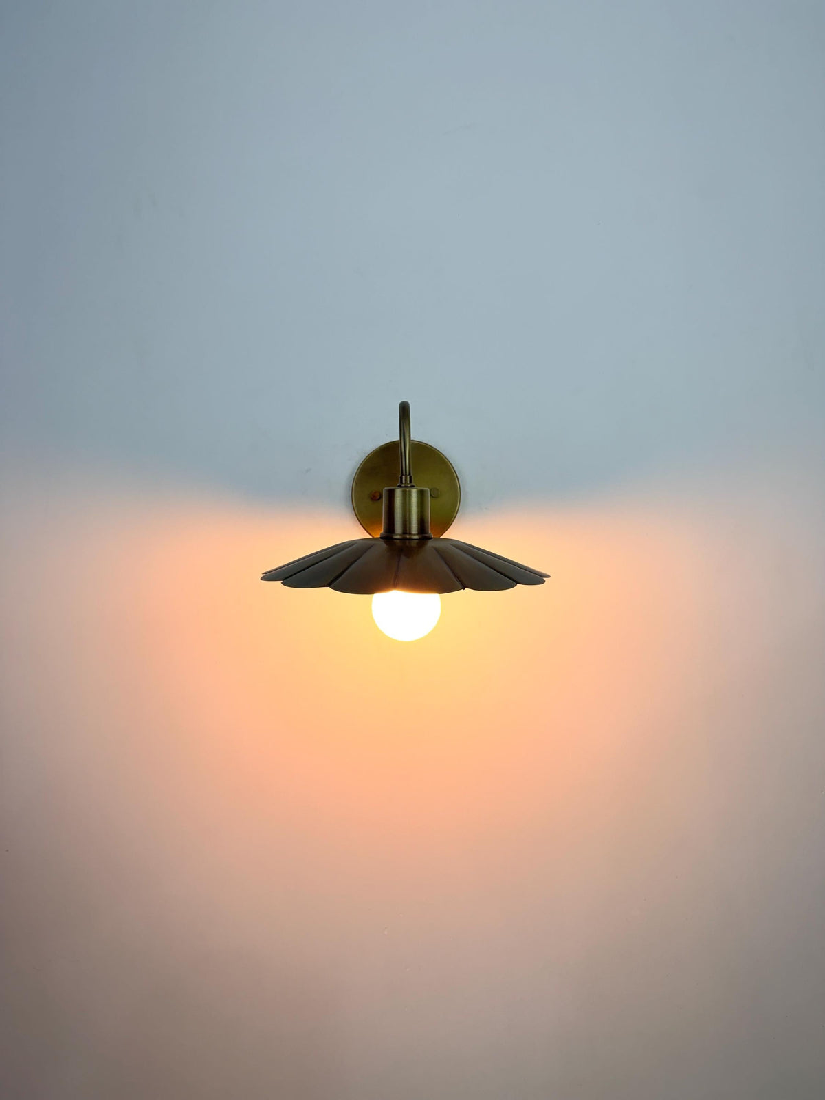 Modern Brass Flower Wall Sconce with Amber Shade | 10" W x 6" H - optimized image