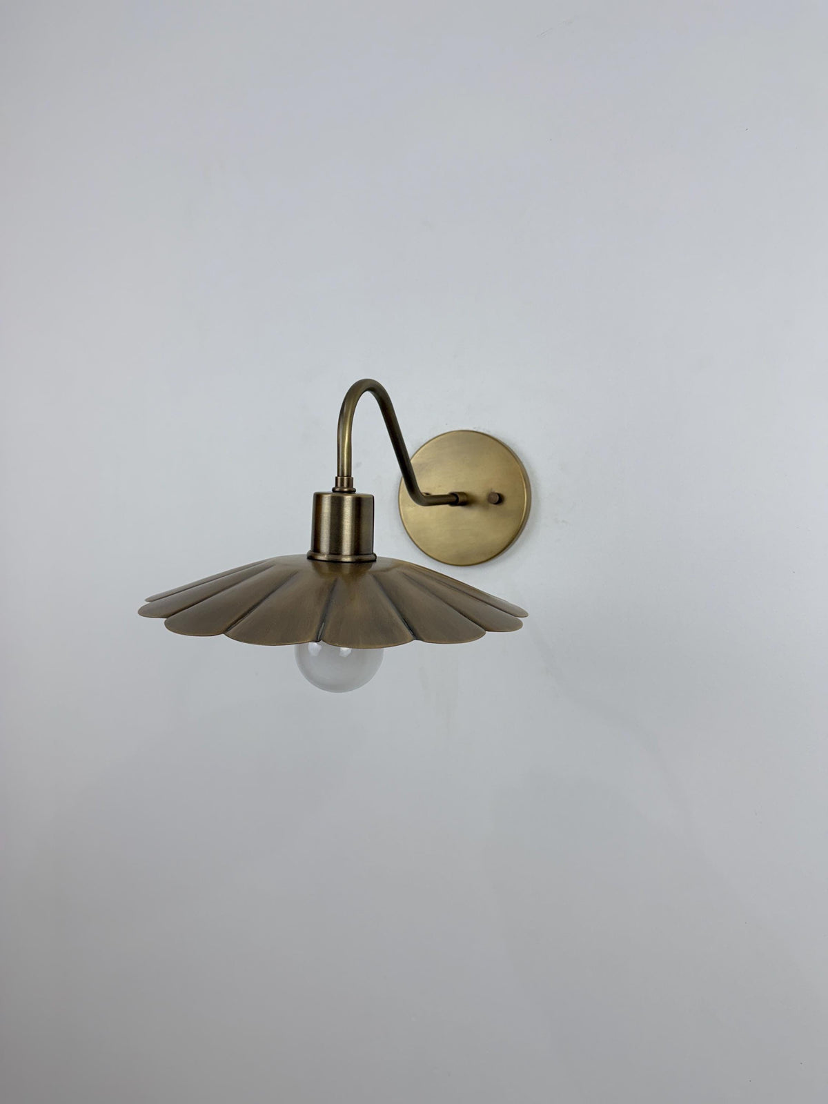 Modern Brass Flower Wall Sconce with Amber Shade | 10" W x 6" H - optimized image
